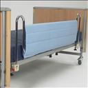 Couverture de protection pour barrière de lit