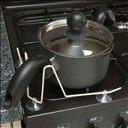Support sécurisé pour manche de casserole